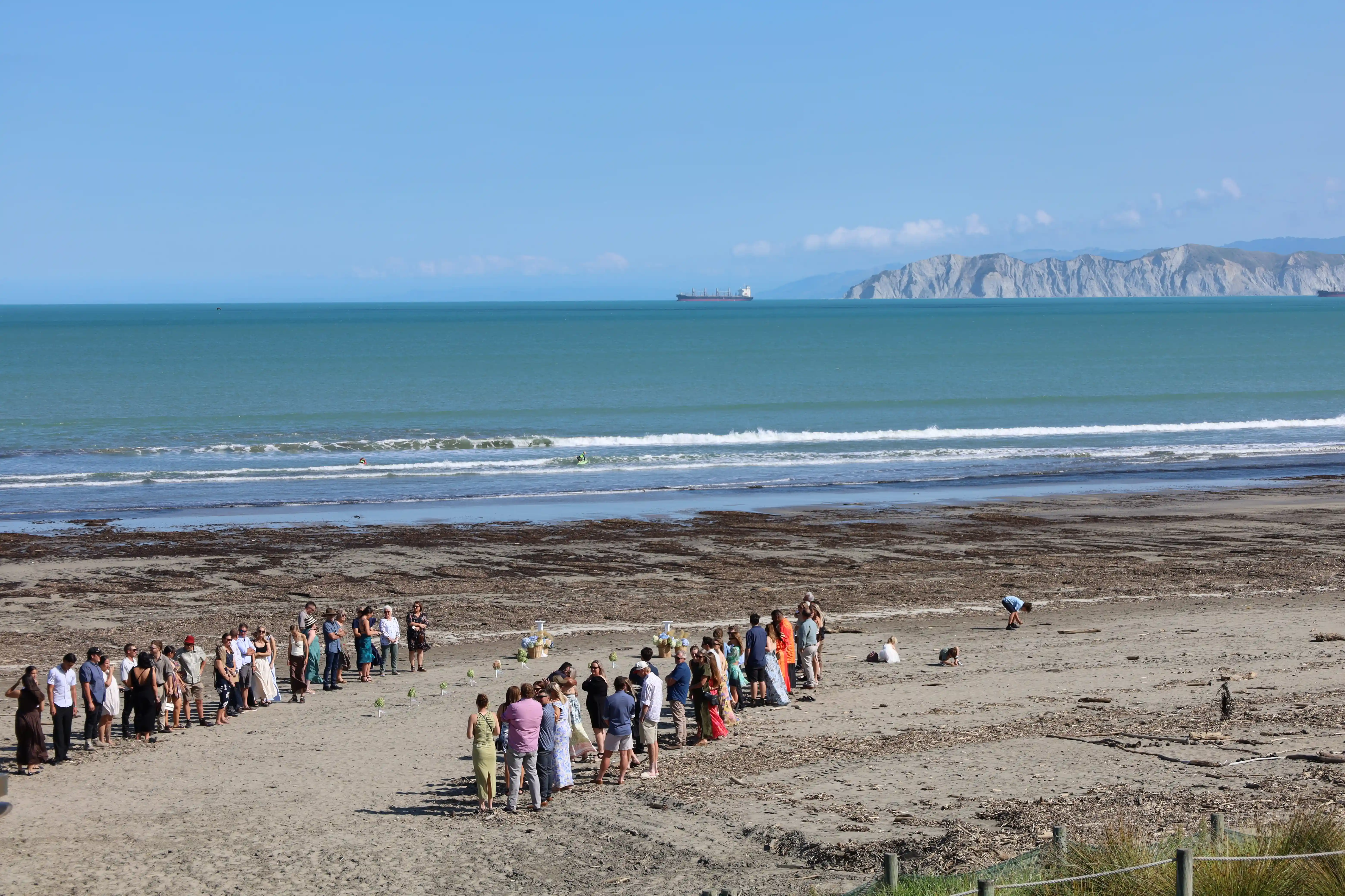 Blue and purple hydrangea centrepieces with table numbers at Gisborne wedding
