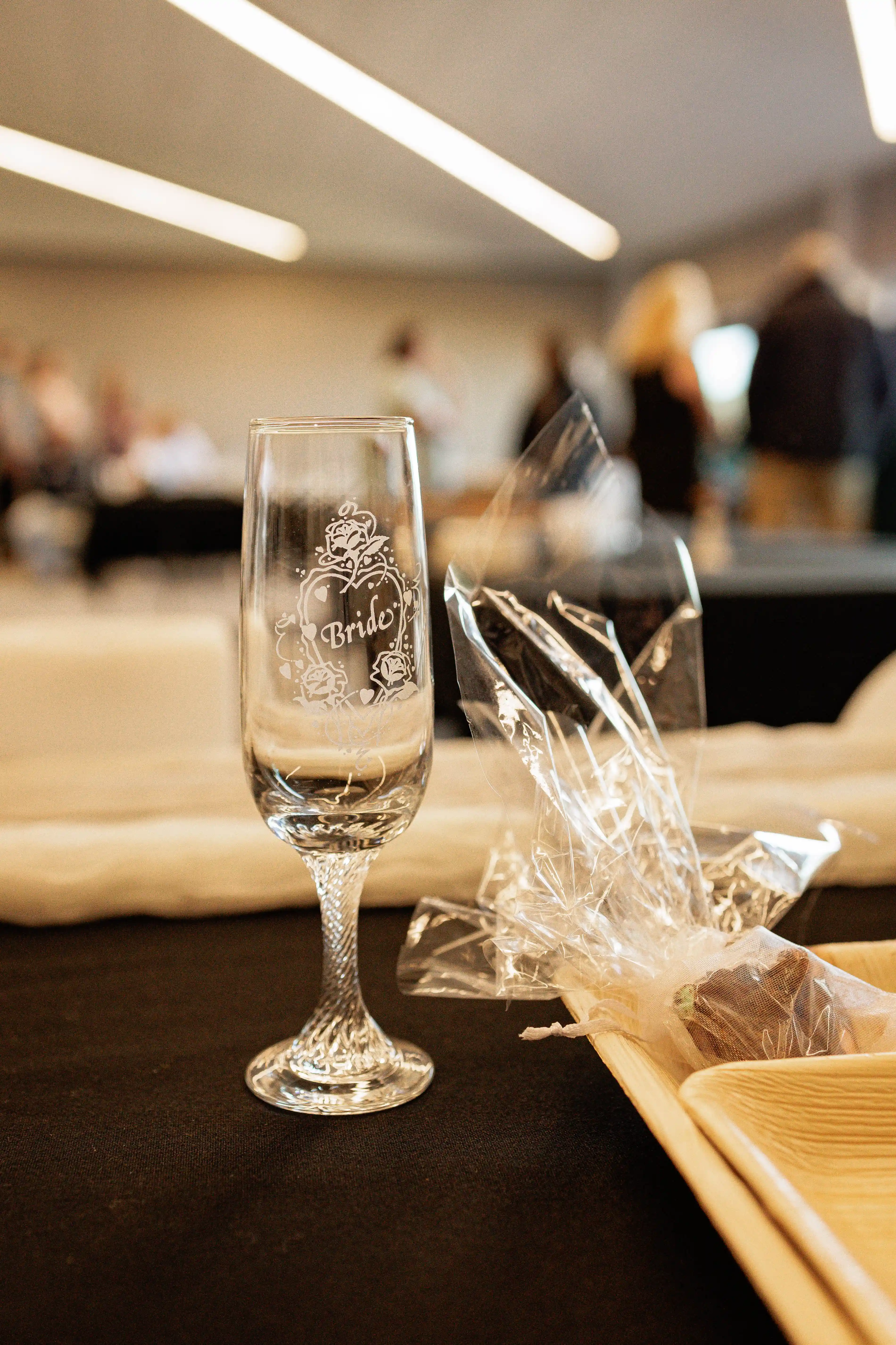 Bride holding champagne flute at Gisborne wedding venue